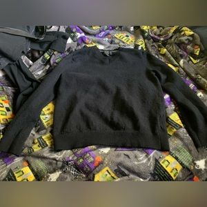 Black v neck sweater with soft material